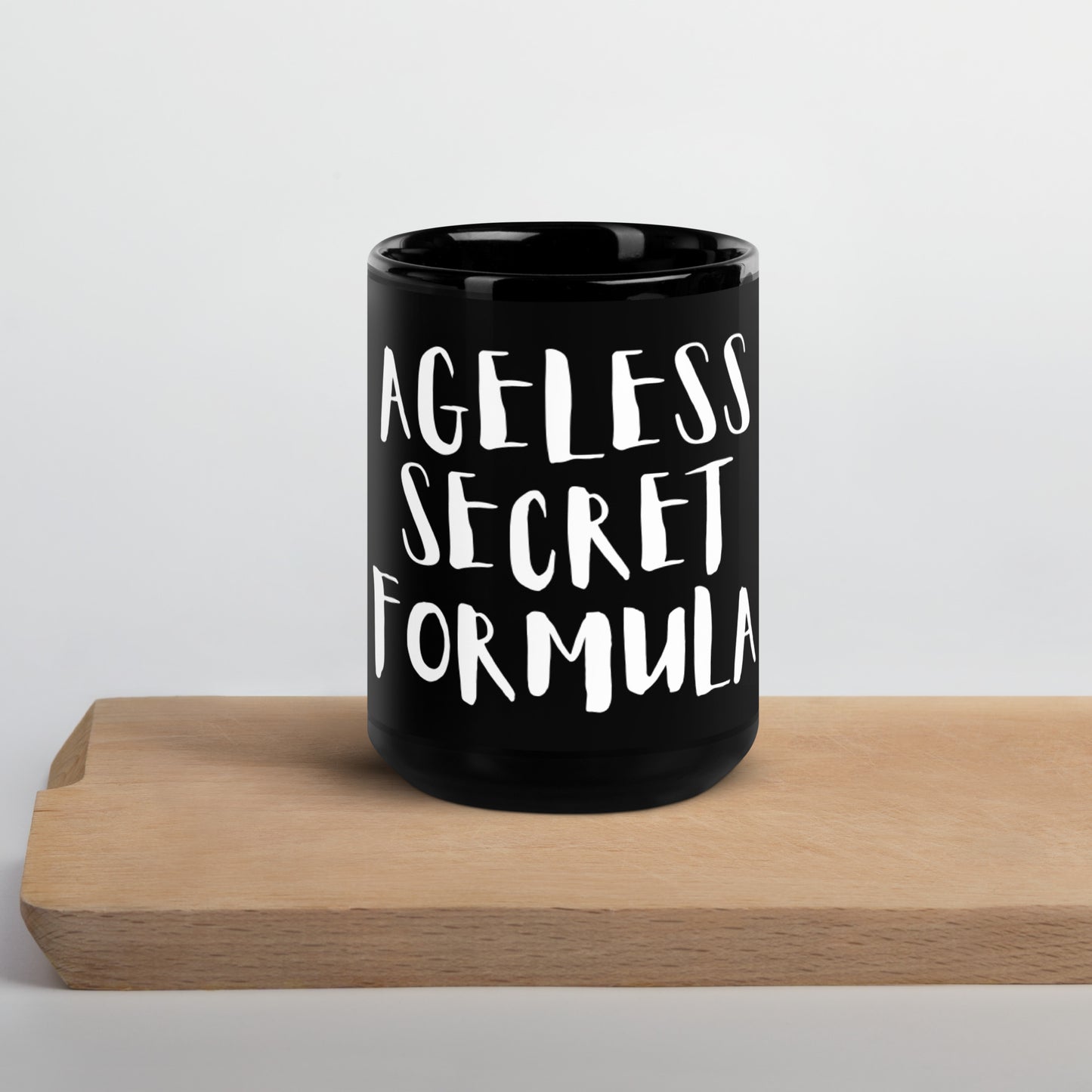 AGELESS SECRET FORMULA Black Glossy Mug