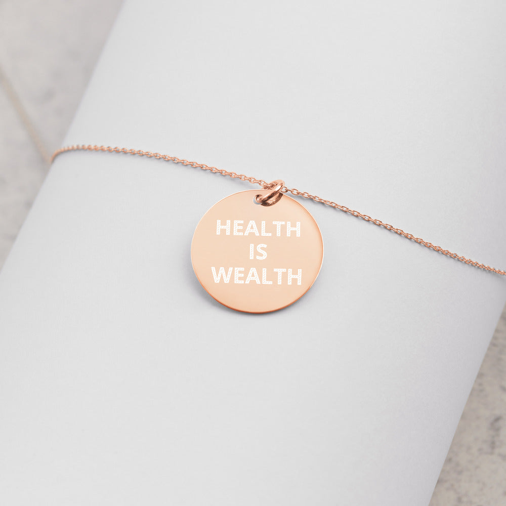 HEALTH IS WEALTH Engraved Silver Disc Necklace