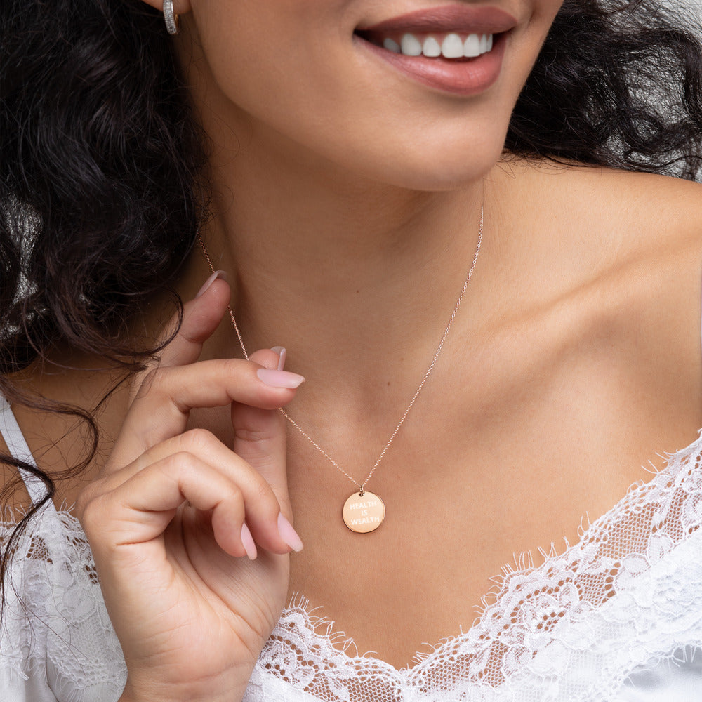 HEALTH IS WEALTH Engraved Silver Disc Necklace