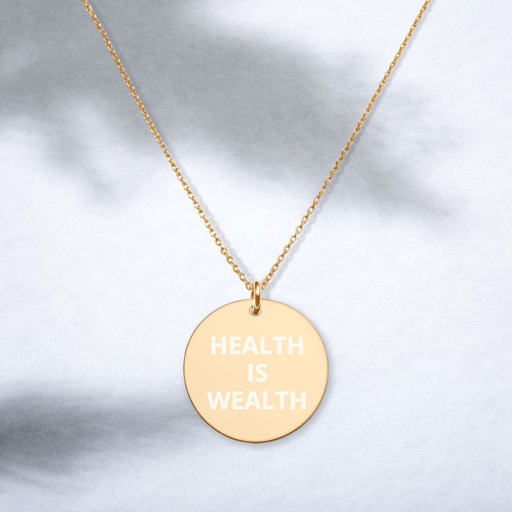 HEALTH IS WEALTH Engraved Silver Disc Necklace