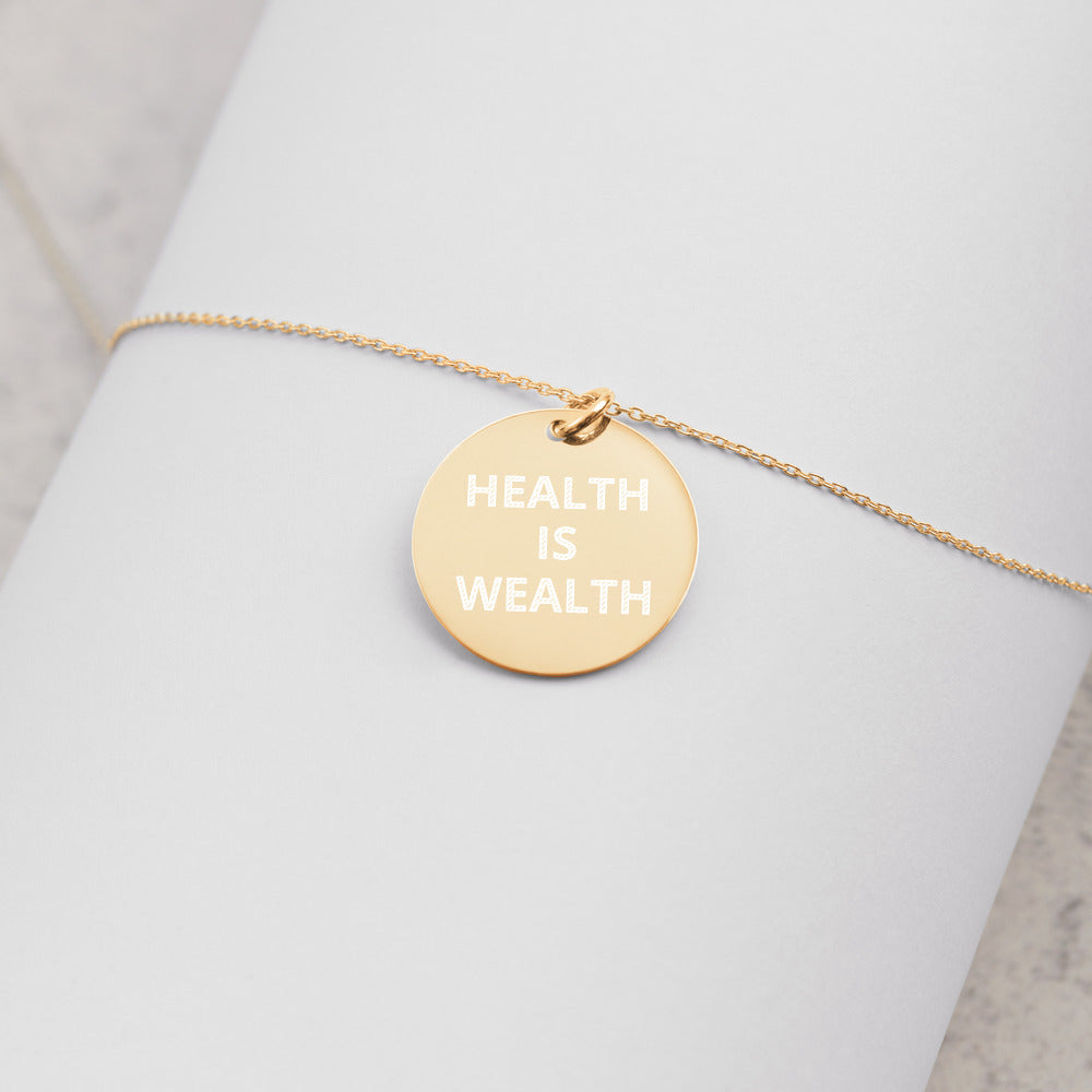 HEALTH IS WEALTH Engraved Silver Disc Necklace