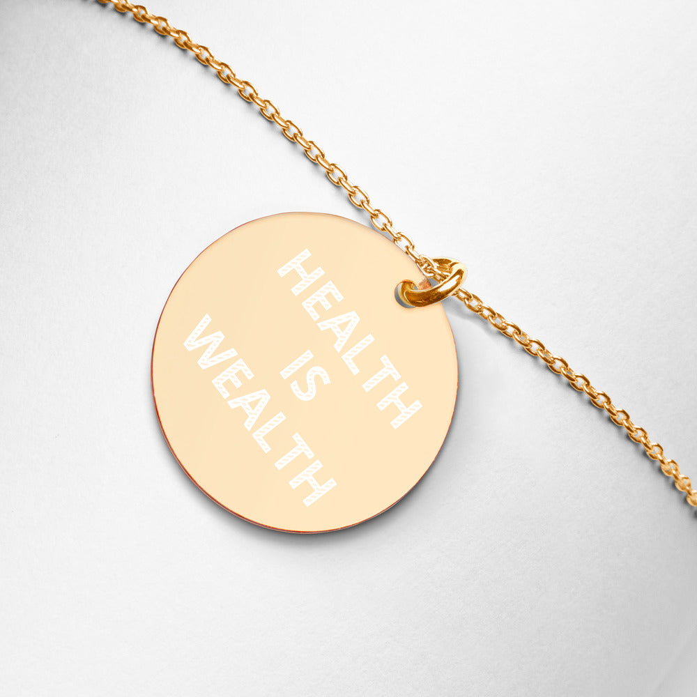 HEALTH IS WEALTH Engraved Silver Disc Necklace