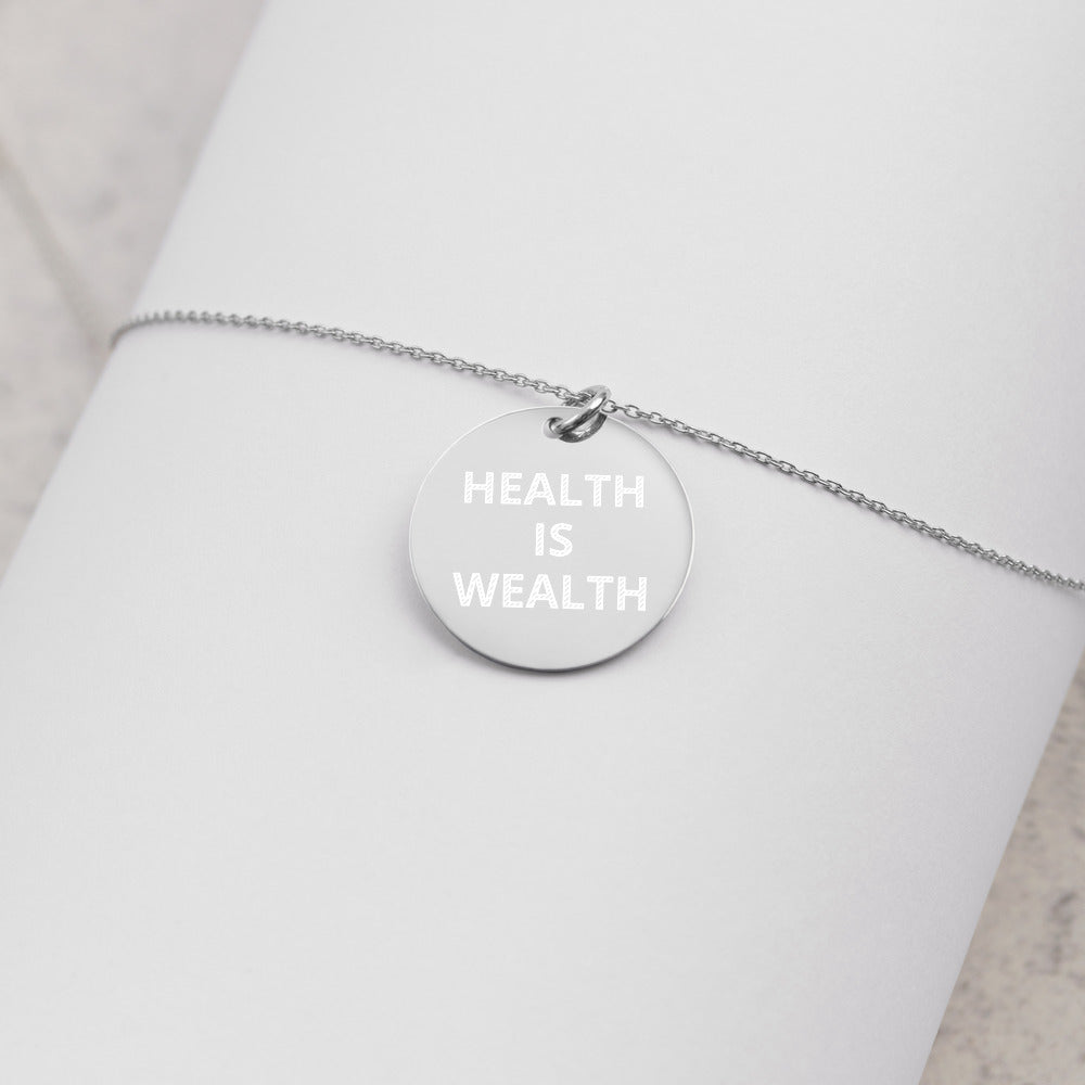 HEALTH IS WEALTH Engraved Silver Disc Necklace