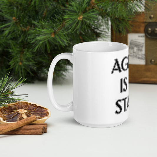 AGELESS IS MY STATUS White glossy mug